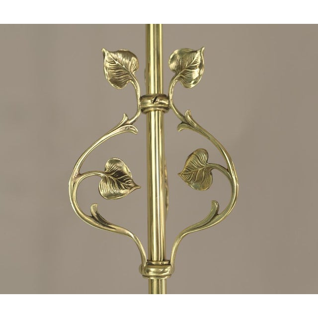 Massive brass hanging lamp with opal overlay glass shade The light provides a pleasant, glare-free light. Polished...