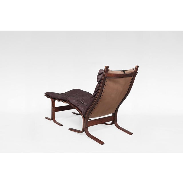 A classic 1970s Siesta lounge chair with ottoman by Ingmar Relling for Westnofa, crafted in Norway and widely recognised...