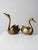 These vintage mid 20th century brass swan planters add a beautiful decorative touch to any room. Crafted from cast brass...