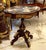 Bring timeless French elegance into your home with this exquisite Louis XVI-inspired round side table. Crafted from...