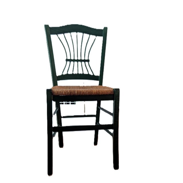 Cute straw seat chairs with charming back. Set of three.