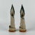 A beautiful and uncommon pair of ceramic vintage candlestick holders. Twirling upward to finish in a flaming victory. Hand...