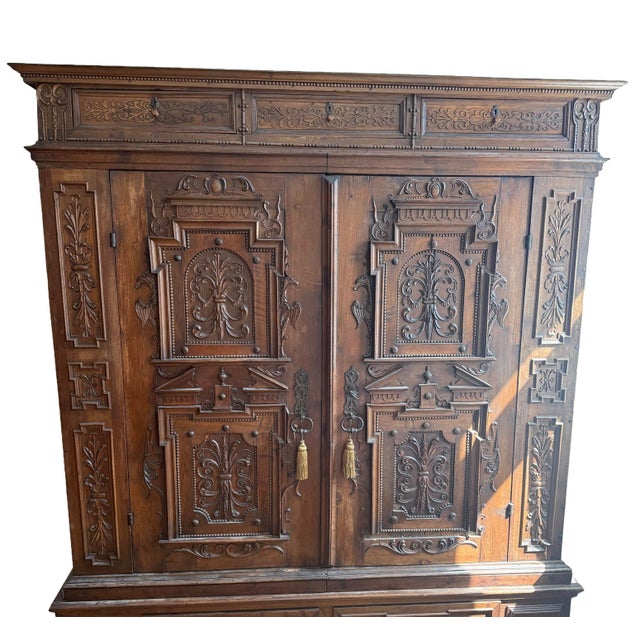 Exceptional antique 17th-century Baroque oak cabinet, composed of four separate sections, designed with a monumental...