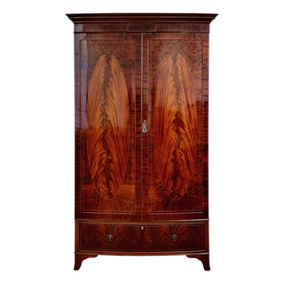 Irish Flame Mahogany Bow Front Armoire by Robert Strahan & Co. For Sale