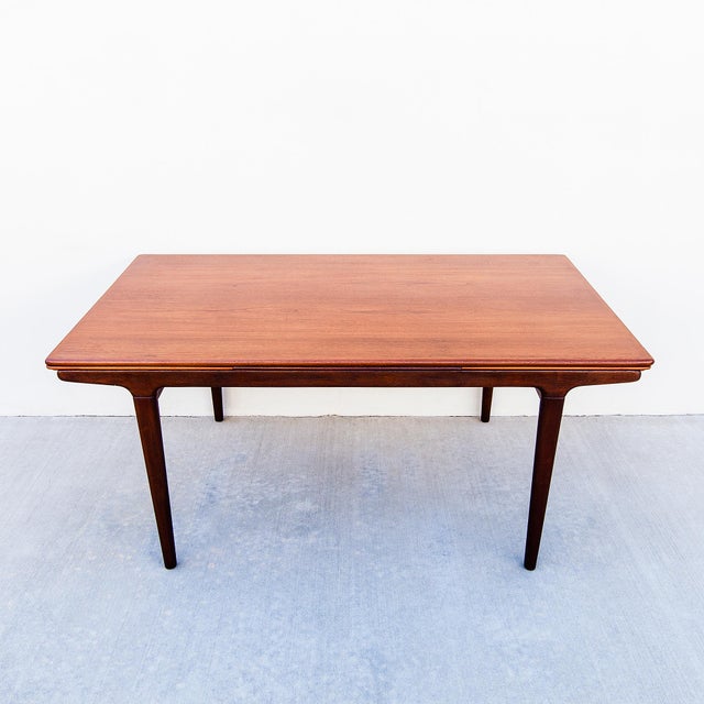Refinished mid century modern draw leaf dining table Attributed to Johannes Andersen, made in Denmark in the 1960s by...