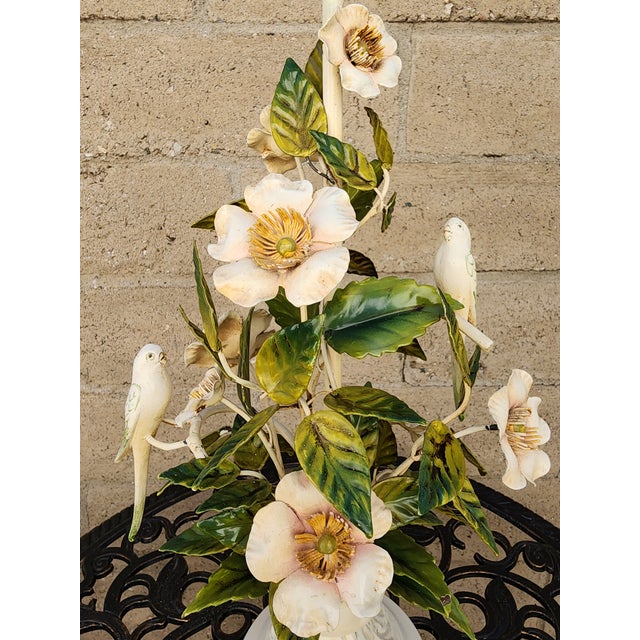 A nature inspired flora & fauna Mid Century Italian tole table lamp. Featuring hand-painted white magnolia blossoms with...