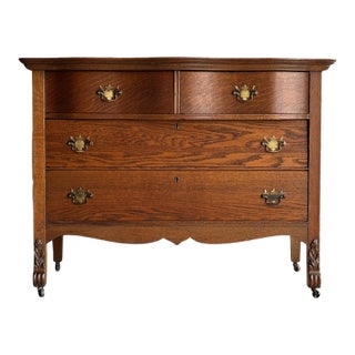 Antique Oak Serpentine Chest With Original Casters and Brass Hardware For Sale