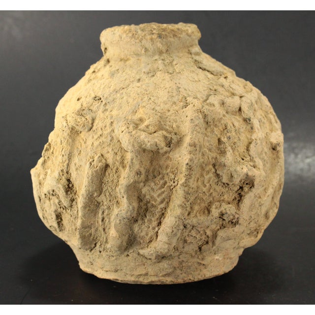 An intriguing antique ceramic artifact A RARE African tribal medicine bottle from Mali, which was eventually unearthed in...