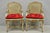 Vintage French Louis XV Style Cream Distress Painted Carved Wood Cane Back and Seat Arm Chairs with Red Loose Cushions - a...