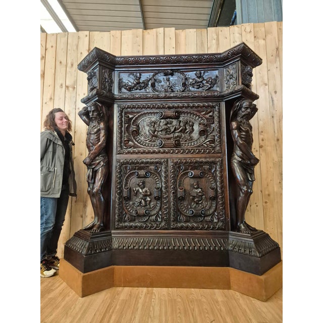 Exceptional 19th-century carved walnut buffet, from a château in the Auxerre region in good condition flanked by two...