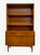 Vintage mid century modern hutch cabinet featuring a clean-lined design with open shelving above and enclosed storage...
