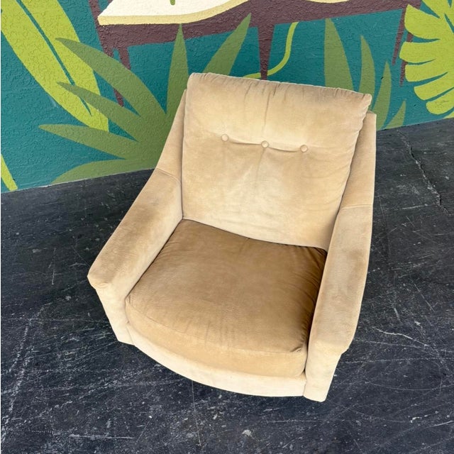 Hefty mid century swivel club chair in good original vintage condition. No manufacturer/designer tags found, but very much...