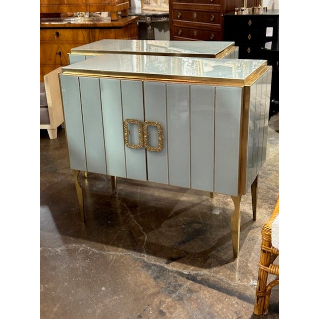 Stylish pair of pale green Murano glass and brass side cabinets. Great for a variety of decors! These can be custom made...