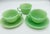 Add a touch of vintage charm to your kitchen with this beautiful Fire King Jane Ray Jadeite cup and saucer set by Anchor...