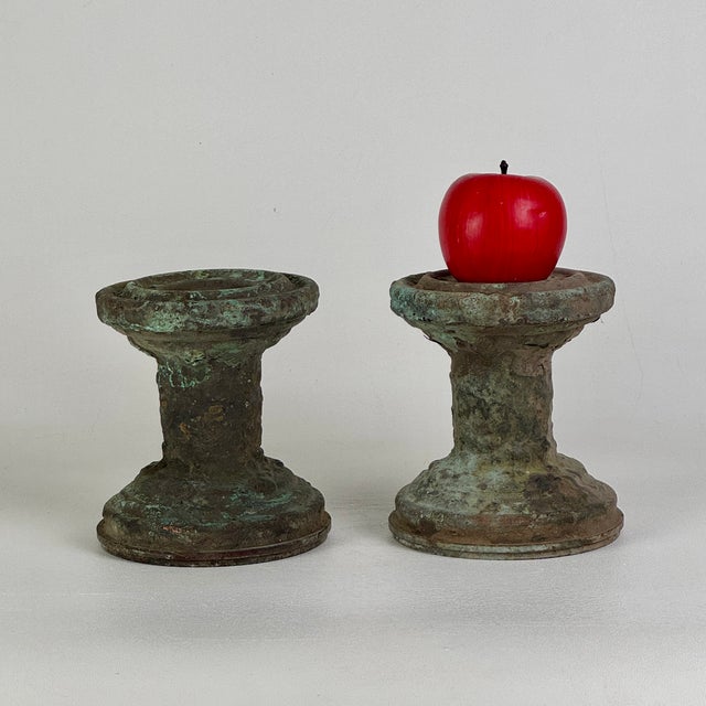 A pair of mystery antique bronze elements from the 19th or early 20th Century. They are solid heavy and have obtained a...