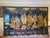 Impressive eight‑panel hand‑painted double view Asian lacquer screen, richly decorated in gold and polychrome pigments...