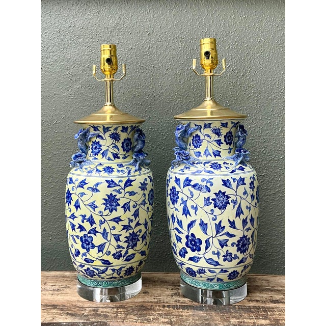 Elevate your interior with this stunning pair of vintage Chinoiserie table lamps, which beautifully marry traditional...