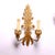 Pair of two-armed sconces in golden metal, with floral themed decorations. Dimensions: Height 40 cm Depth 13 cm Max width...