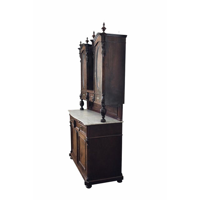 Elegant and substantial antique buffet hutch crafted in richly figured burl walnut veneer, dating to the late 19th century...