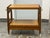 Design Plus Gallery presents a Vintage Union Made Mid-Century Drop-Leaf Rolling Bar Cart. The wood frame showcases linear...