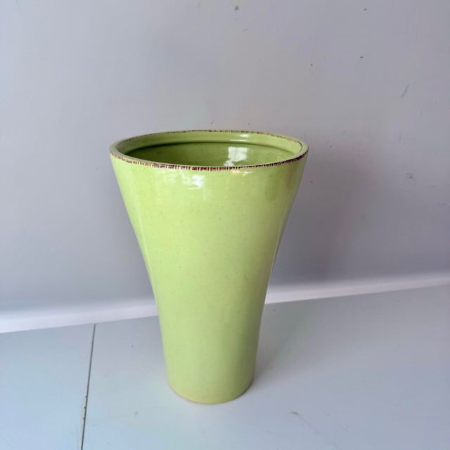 Vintage Vietri style large green ceramic tapered vase. The piece has delicate brown painted feather stroke details within...