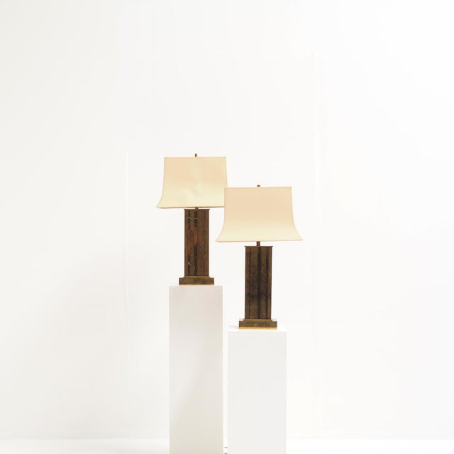 A pair of large table lamps by Belgian designer Willy Daro, dating from the 1970s. The tall rectangular bases are crafted...