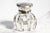 A striking expression of the Art Nouveau movement, this exceptional antique crystal and sterling silver inkwell transforms...