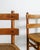 A very rare and iconic set of early swedish mid century modern "sandhamn" dining chairs in carved stained pine wood with...