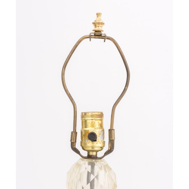 Louis XVI Style Gilt Bronze Two-Branch Girandole Mounted as a Table Lamp, with teardrop cut crystal drops mounted on a...