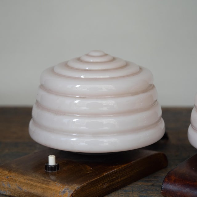 Pair of 1940s table lamps. Wooden frame and pink Murano glass diffusers. Unsold stock, never used. Up to 250V (Europe/UK...
