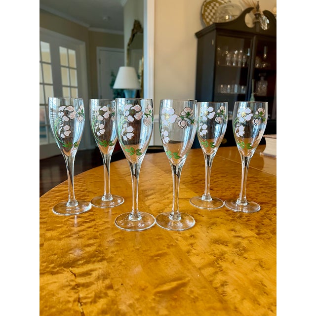 Set of 6 vintage French hand-enameled floral crystal champagne flutes from the renowned French champagne house Pierre-...