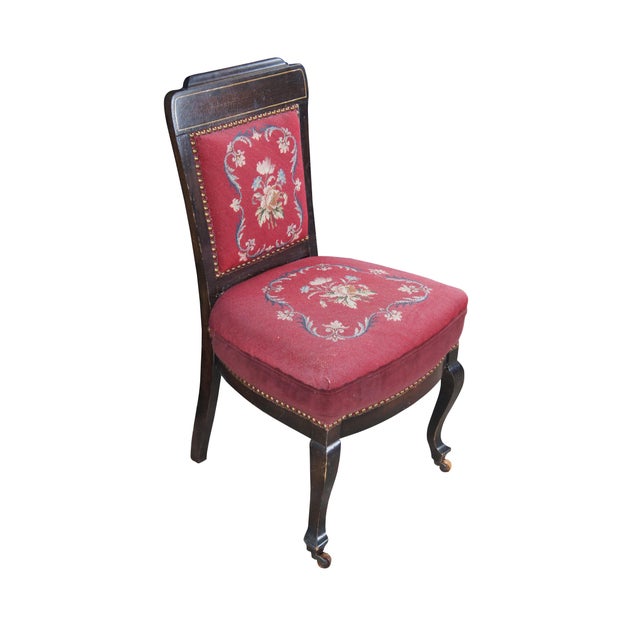 Antique English Edwardian vanity / desk / parlor side chair. Made of mahogany featuring a Neoclassical floral needlepoint...