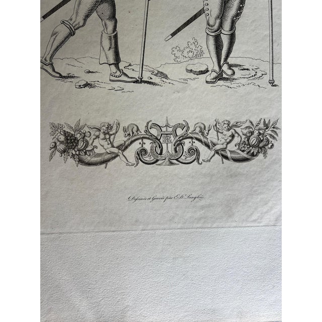This mid 19th century etching reproduction depicts two soldiers dressed in the style of the reigns of French kings Charles...