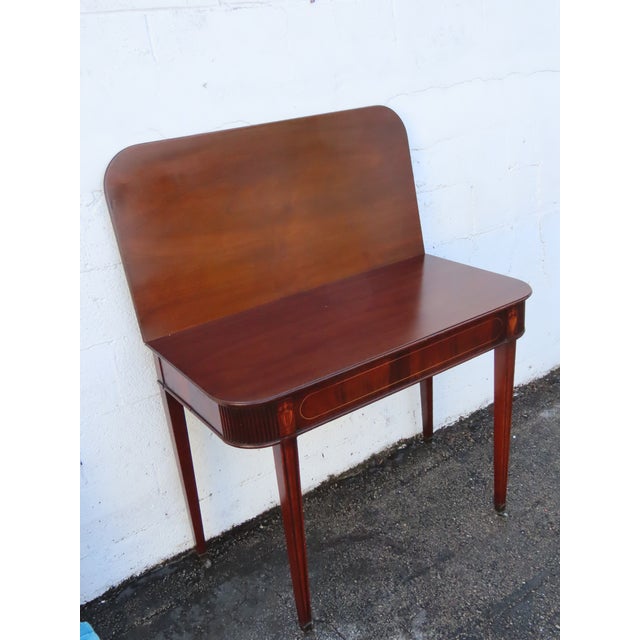 This Console Extension Table is made of wood, solid wood, mahogany, and veneer. This wonderful Table was made in the...