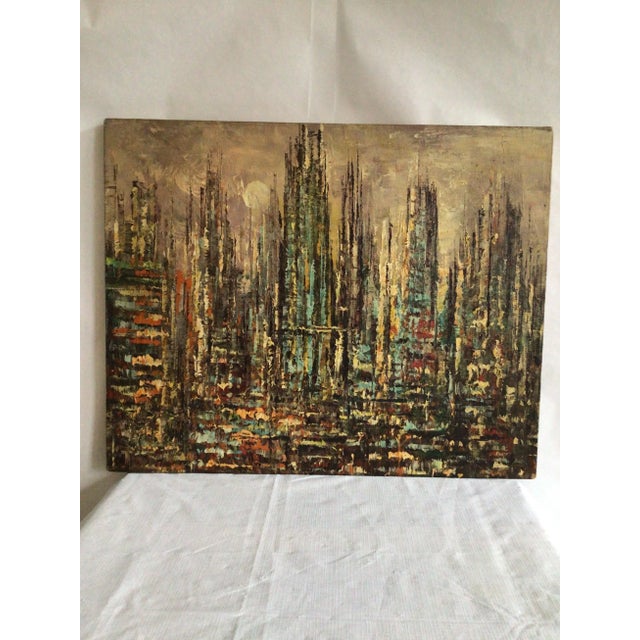 1950s Oil Painting on Canvas Of Abstract Cityscape Wood frame under stretched canvas Skyscrapers against cloudy sky