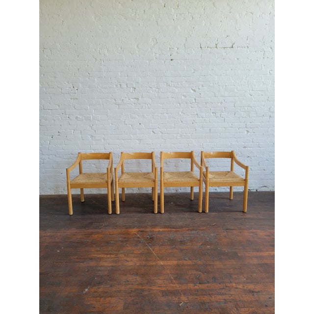 1970s Carimate chairs by Vico Magistretti, a classic! Set of 4. Solid wood frame with rush seat. In good original...