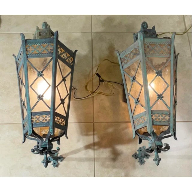 These stunning vintage wall sconces are crafted from solid brass and feature a beautiful distressed finish that adds a...