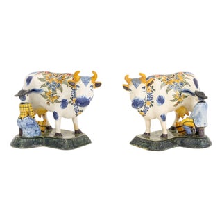 Dutch Delft Cow and Milkmaid Figurines, Pair For Sale