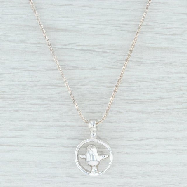 This great pendant & necklace set features a chunky pendant with an adorable 3D bird perched at the center of a circle....