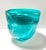 A striking hand-blown art glass vessel featuring dramatic turquoise and aqua swirled striations. The sculptural organic...