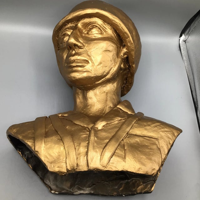 Here is a hand made plaster and composite military male soldier bust. Not sure what part of the military but looks like...