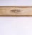 A sleek solid brass English panel fireplace fender centered on a high relief embossed oval brass patera and with...