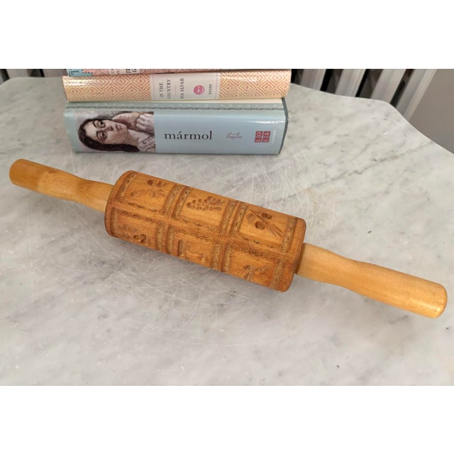 This German springerle rolling pin is a beautifully crafted tool for creating traditional embossed cookies. Made from...