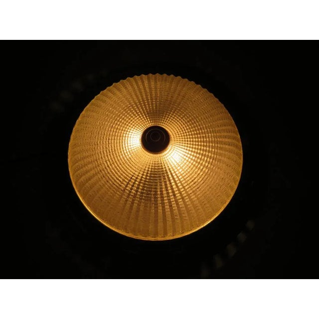 Round white and gold colored metal frame and glass dome made of processed glass. The diameter of the lamp is 34 cm and the...