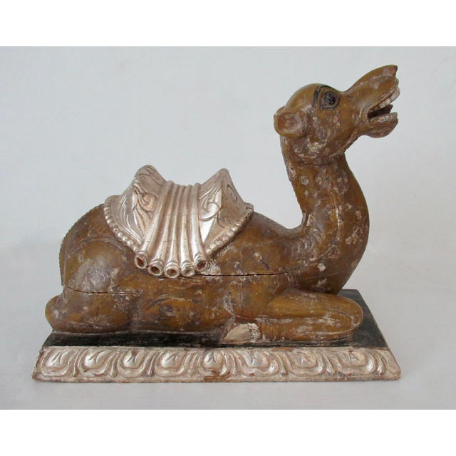 Vintage: Antique, Far-Eastern, Anglo-Indian; import of a hand-crafted, wood-carved, & silver leaf adorned Camel in repose,...