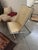 Designed by Ward Bennett in 1964, this authentic 2006 production Scissor Chair features its original almond leather...