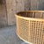Cane and Bamboo plant holder on wheels Dimensions 56cm diameter height 30cm inc wheels Height in planter 22cm excellent...