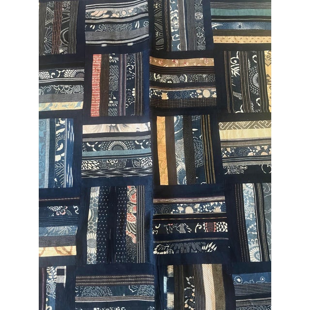 This stunning vintage art quilt made with antique indigo belonged to a collector who traveled the world, mostly in Asia,...