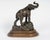 Sculpture in patinated bronze, wooden base, 19th century, napoleon iii period, representing an elephant, trunk raised,...
