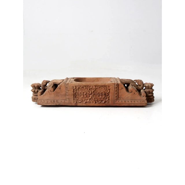 This antique wooden centerpiece is a stunning work of art, featuring intricate mythical bird carvings and inset wood wheel...